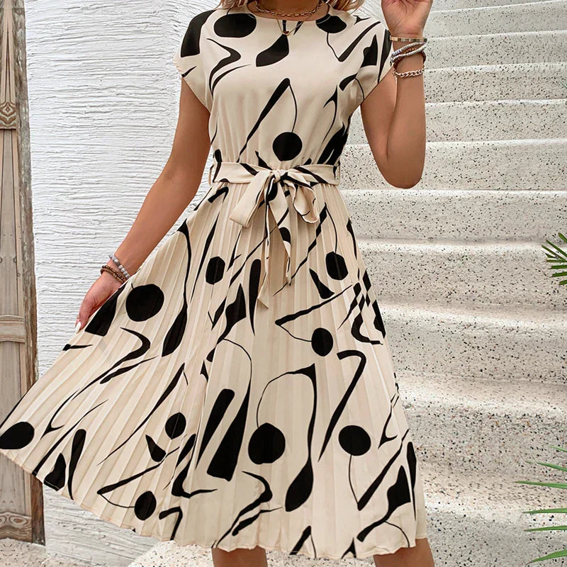 Allaine | Elegante geplisseerde midi-jurk met tailleceintuur