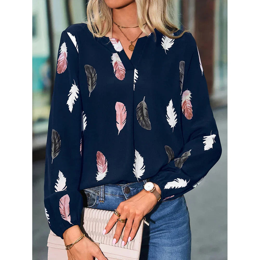 Nefeli | Elegante blouse met speelse verenprint