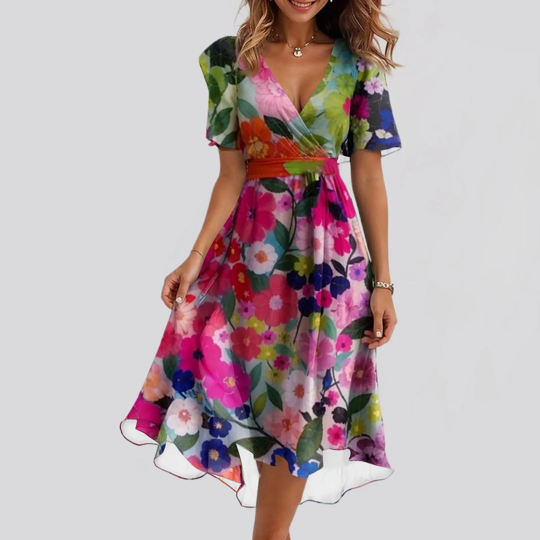 Sibyl | Elegante bloemenjurk met zwierige pasvorm