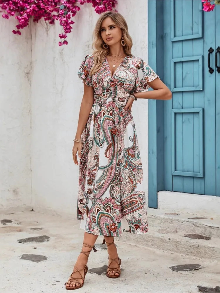 Sandra | Zomerse wikkeljurk met paisley charme