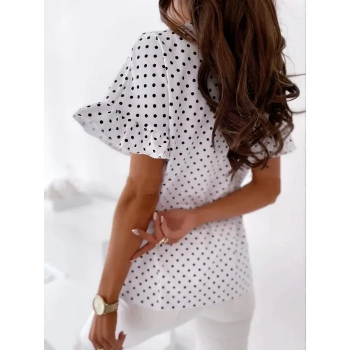 Velia | Charmante blouse met polkadotprint