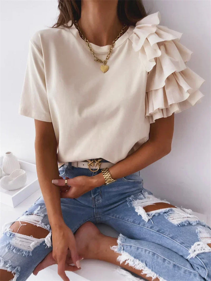 Anna | Trendy top met statement rufflemouw