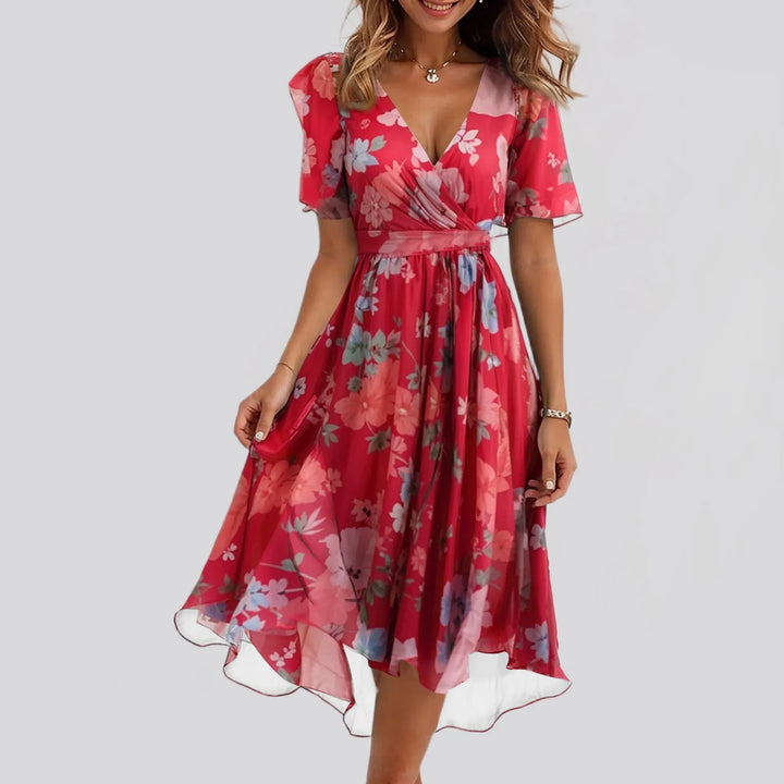 Sibyl | Elegante bloemenjurk met zwierige pasvorm