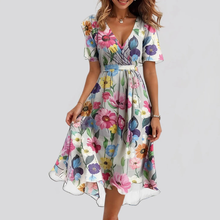 Sibyl | Elegante bloemenjurk met zwierige pasvorm