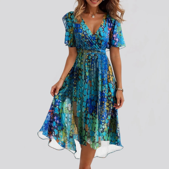 Sibyl | Elegante bloemenjurk met zwierige pasvorm