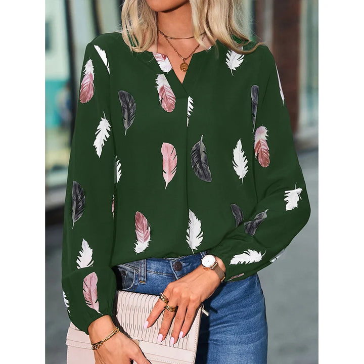 Nefeli | Elegante blouse met speelse verenprint