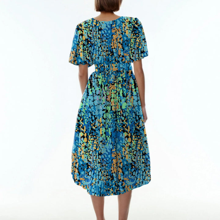 Sibyl | Elegante bloemenjurk met zwierige pasvorm