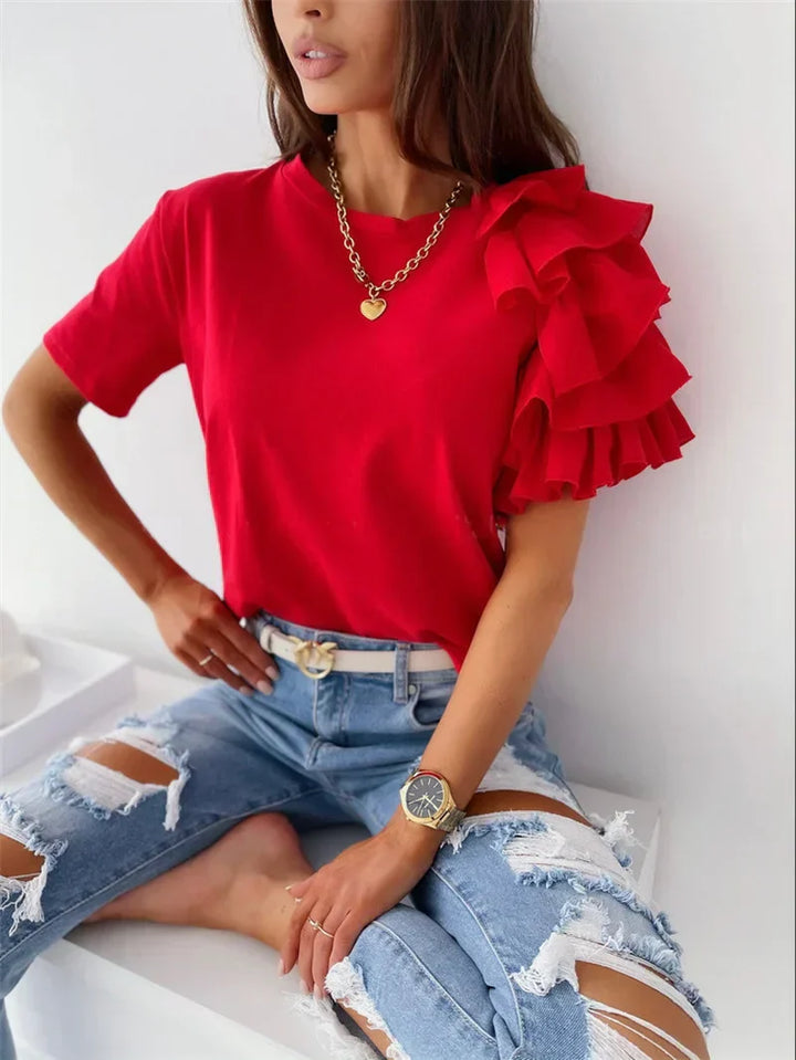 Anna | Trendy top met statement rufflemouw